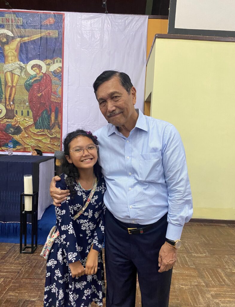 Eventually, I got to take a picture with THE ONE AND ONLY Mr Luhut Pandjaitan. First, we took one with my parents, then with me and him alone. He asked how much I scored on my math test. I replied, around ninety. He said that I should get more than my dad. This made me flush so hard. He suggested to take another photo, before I went.